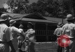 Image of Japanese teach semaphore signaling to Borneo natives Borneo, 1942, second 34 stock footage video 65675050779
