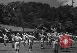 Image of Japanese teach semaphore signaling to Borneo natives Borneo, 1942, second 36 stock footage video 65675050779