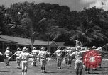 Image of Japanese teach semaphore signaling to Borneo natives Borneo, 1942, second 37 stock footage video 65675050779