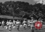 Image of Japanese teach semaphore signaling to Borneo natives Borneo, 1942, second 39 stock footage video 65675050779