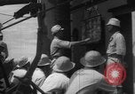 Image of Japanese teach semaphore signaling to Borneo natives Borneo, 1942, second 41 stock footage video 65675050779