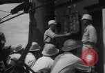 Image of Japanese teach semaphore signaling to Borneo natives Borneo, 1942, second 42 stock footage video 65675050779