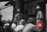 Image of Japanese teach semaphore signaling to Borneo natives Borneo, 1942, second 43 stock footage video 65675050779