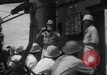 Image of Japanese teach semaphore signaling to Borneo natives Borneo, 1942, second 44 stock footage video 65675050779