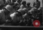 Image of Japanese teach semaphore signaling to Borneo natives Borneo, 1942, second 47 stock footage video 65675050779