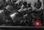 Image of Japanese teach semaphore signaling to Borneo natives Borneo, 1942, second 48 stock footage video 65675050779