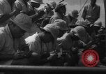 Image of Japanese teach semaphore signaling to Borneo natives Borneo, 1942, second 49 stock footage video 65675050779