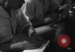 Image of Japanese teach semaphore signaling to Borneo natives Borneo, 1942, second 51 stock footage video 65675050779