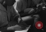 Image of Japanese teach semaphore signaling to Borneo natives Borneo, 1942, second 52 stock footage video 65675050779