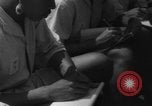 Image of Japanese teach semaphore signaling to Borneo natives Borneo, 1942, second 53 stock footage video 65675050779