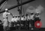 Image of Japanese teach semaphore signaling to Borneo natives Borneo, 1942, second 54 stock footage video 65675050779