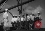 Image of Japanese teach semaphore signaling to Borneo natives Borneo, 1942, second 57 stock footage video 65675050779