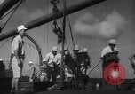 Image of Japanese teach semaphore signaling to Borneo natives Borneo, 1942, second 59 stock footage video 65675050779
