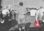 Image of Filipino men working under Japanese occupation Manila Philippines, 1942, second 8 stock footage video 65675050780