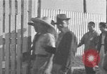 Image of Filipino men working under Japanese occupation Manila Philippines, 1942, second 13 stock footage video 65675050780