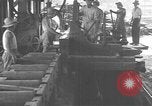 Image of Filipino men working under Japanese occupation Manila Philippines, 1942, second 20 stock footage video 65675050780