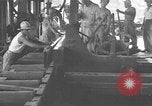 Image of Filipino men working under Japanese occupation Manila Philippines, 1942, second 25 stock footage video 65675050780