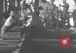 Image of Filipino men working under Japanese occupation Manila Philippines, 1942, second 26 stock footage video 65675050780