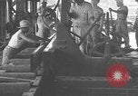 Image of Filipino men working under Japanese occupation Manila Philippines, 1942, second 27 stock footage video 65675050780