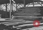 Image of Filipino men working under Japanese occupation Manila Philippines, 1942, second 36 stock footage video 65675050780