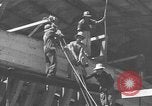 Image of Filipino men working under Japanese occupation Manila Philippines, 1942, second 48 stock footage video 65675050780
