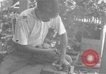 Image of Filipino men working under Japanese occupation Manila Philippines, 1942, second 49 stock footage video 65675050780