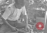 Image of Filipino men working under Japanese occupation Manila Philippines, 1942, second 50 stock footage video 65675050780