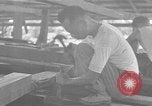 Image of Filipino men working under Japanese occupation Manila Philippines, 1942, second 52 stock footage video 65675050780