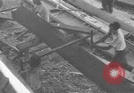 Image of Filipino men working under Japanese occupation Manila Philippines, 1942, second 55 stock footage video 65675050780
