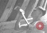 Image of Filipino men working under Japanese occupation Manila Philippines, 1942, second 60 stock footage video 65675050780