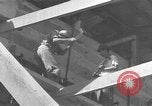 Image of Filipino men working under Japanese occupation Manila Philippines, 1942, second 62 stock footage video 65675050780