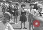 Image of Filipino people during Japanese occupation Manila Philippines, 1942, second 20 stock footage video 65675050781