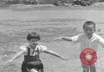 Image of Filipino people during Japanese occupation Manila Philippines, 1942, second 27 stock footage video 65675050781