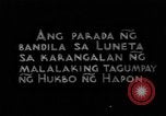 Image of Japanese victory march Manila Philippines, 1942, second 1 stock footage video 65675050783