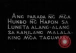 Image of Japanese victory march Manila Philippines, 1942, second 1 stock footage video 65675050784