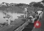 Standbild Santo Tomas Konzentrationslager Manila Philippinen, 1945, aus Sekunde 32 historischem Filmmaterial Videoclip 65675050795