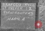 Image of U.S. Airborne infantry preparing for a mission Manila Philippines, 1945, second 4 stock footage video 65675050802