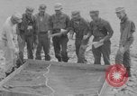 Image of U.S. Airborne infantry preparing for a mission Manila Philippines, 1945, second 5 stock footage video 65675050802