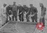 Image of U.S. Airborne infantry preparing for a mission Manila Philippines, 1945, second 6 stock footage video 65675050802