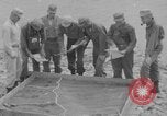 Image of U.S. Airborne infantry preparing for a mission Manila Philippines, 1945, second 7 stock footage video 65675050802