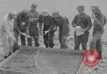 Image of U.S. Airborne infantry preparing for a mission Manila Philippines, 1945, second 9 stock footage video 65675050802
