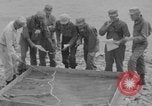 Image of U.S. Airborne infantry preparing for a mission Manila Philippines, 1945, second 10 stock footage video 65675050802