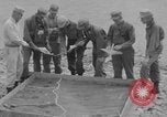 Image of U.S. Airborne infantry preparing for a mission Manila Philippines, 1945, second 12 stock footage video 65675050802