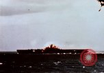 Image of Japanese Kamikaze aircraft hits USS Lexington Pacific Ocean, 1944, second 11 stock footage video 65675050812