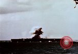 Image of Japanese Kamikaze aircraft hits USS Lexington Pacific Ocean, 1944, second 15 stock footage video 65675050812