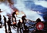 Image of Japanese Kamikaze aircraft hits USS Lexington Pacific Ocean, 1944, second 17 stock footage video 65675050812