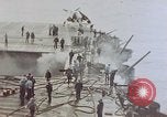 Image séquelles de kamikaze attaque sur USS Enterprise Océan Pacifique, 1945, de la seconde 4 séquences d'archives historiques vidéo 65675050831