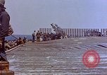 Image of USS Enterprise CV-6 after Kamikaze attack Pacific Ocean, 1945, second 32 stock footage video 65675050832