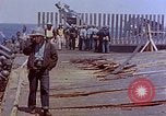 Image of USS Enterprise CV-6 after Kamikaze attack Pacific Ocean, 1945, second 42 stock footage video 65675050832