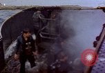 Image of CV-6 USS Enterprise aftermath of kamikaze attack Pacific Ocean, 1945, second 1 stock footage video 65675050833